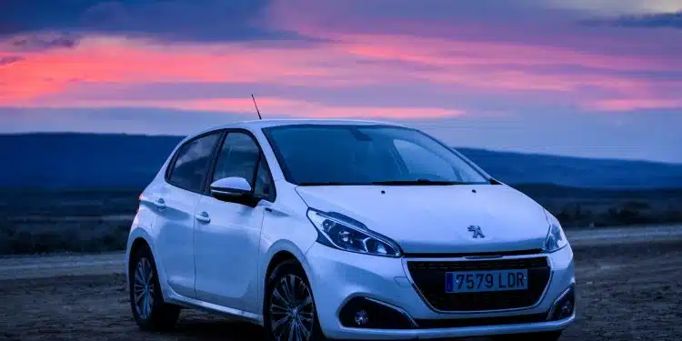 silver honda sedan on brown sand during sunset