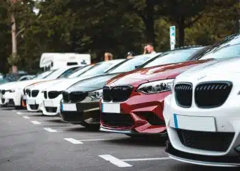 white and red bmw m 3 on road during daytime