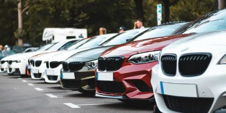 white and red bmw m 3 on road during daytime