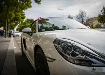 white porsche 911 on road during daytime