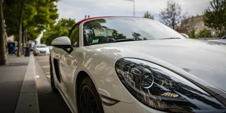 white porsche 911 on road during daytime